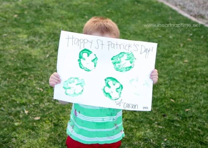 Kids shamrock crafting with bell peppers