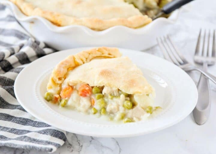piece of homemade chicken pot pie on a white plate