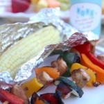 Chicken shish kabobs and grilled corn