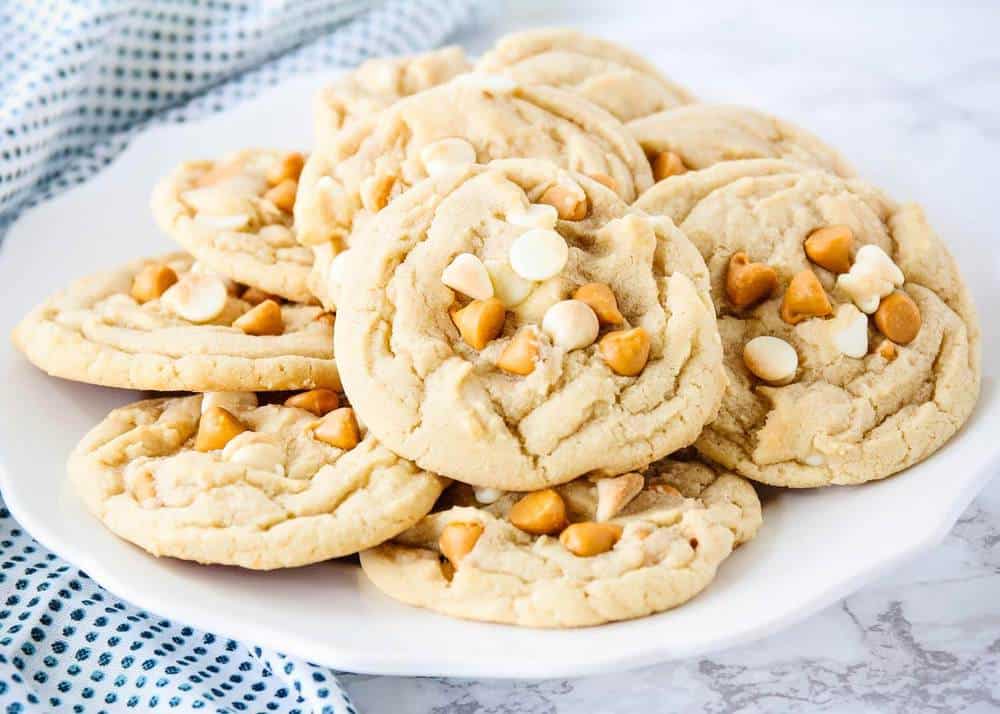 Butterscotch cookies on a white plate.