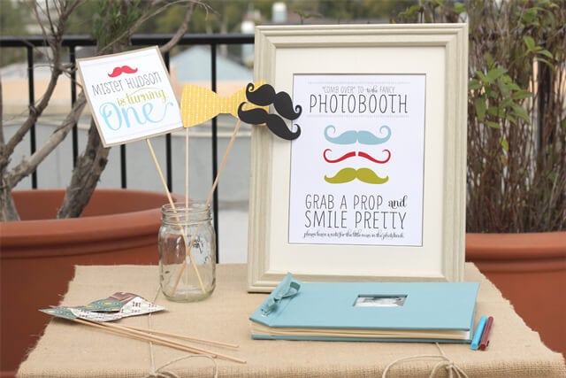 A photo booth sign on a table