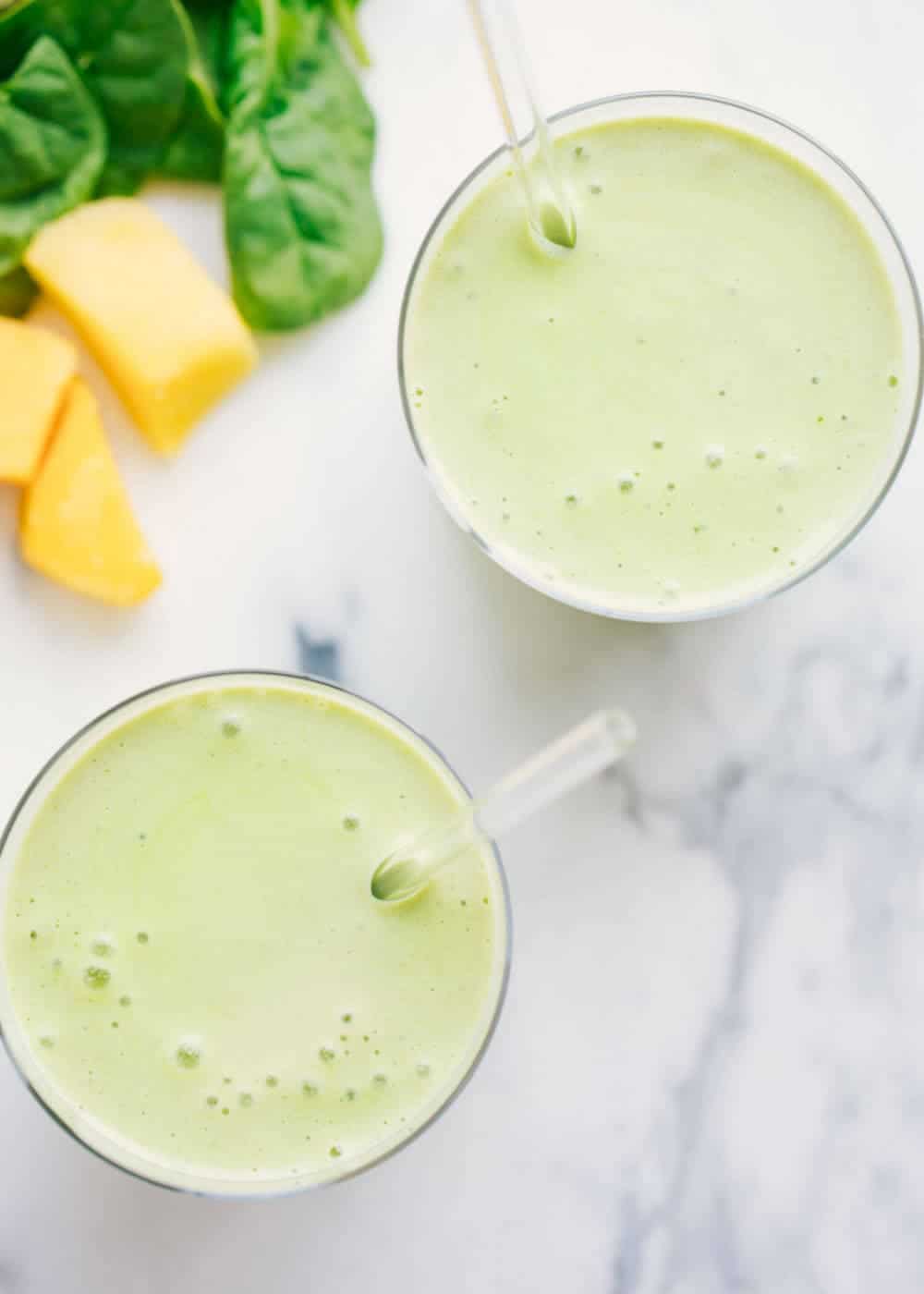 Two glasses of green smoothies.