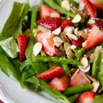 a close up of strawberry asparagus salad