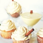 frosted eggnog cupcakes with cinnamon sticks