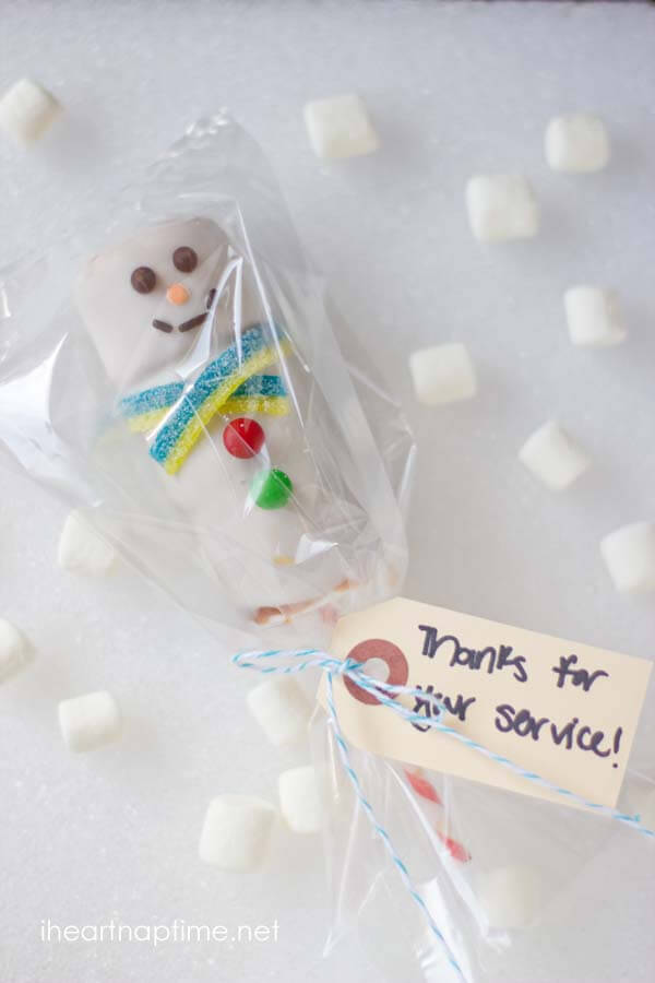 marshmallow snowman wrapped in cellophane with a gift tag 