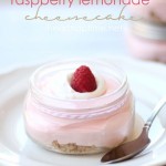 raspberry lemonade cheesecake cool whip in glass container with spoon