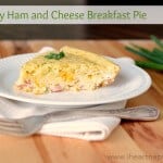 slice of ham and cheese breakfast pie on plate