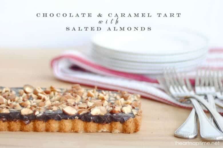 caramel chocolate almond tart on wood table 