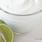 A close up of a bowl of key lime fruit dip