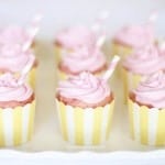 pink lemonade cupcakes on a white plate