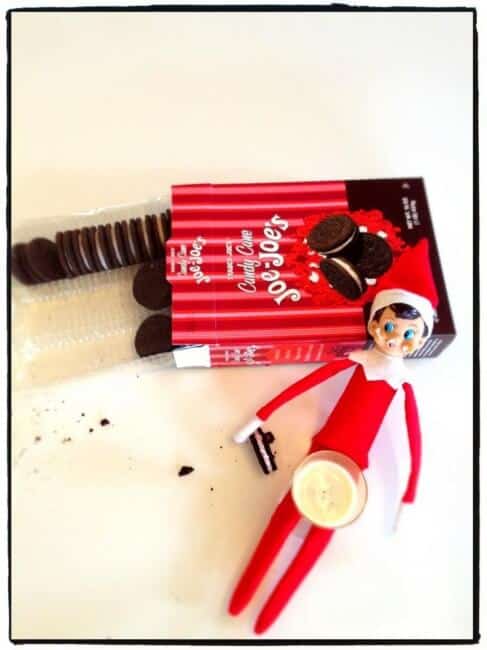 Top 50 of the BEST Elf on the Shelf ideas - So many fun ideas to do with your Elf leading up to Christmas! Your family will love these list amazing list of elf ideas! Elf eating cookies