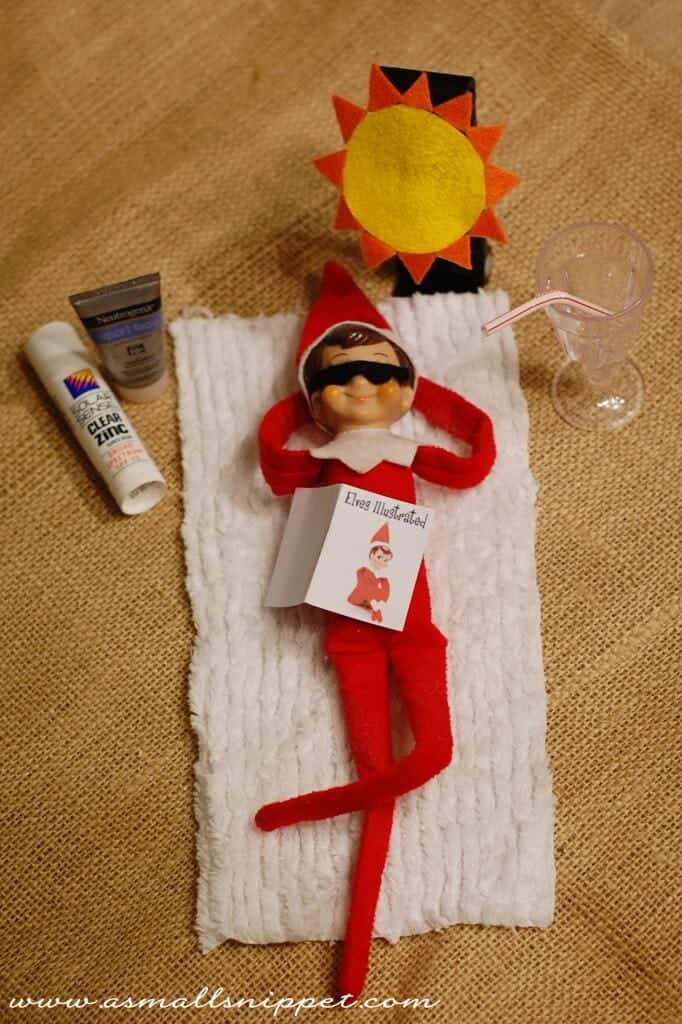 Elf sun bathing on a mini towel.