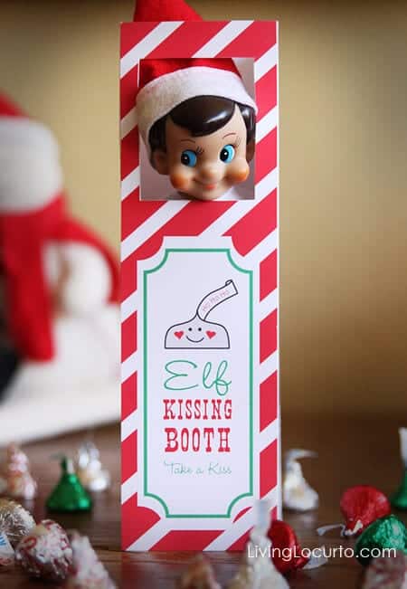 Top 50 of the BEST Elf on the Shelf ideas - So many fun ideas to do with your Elf leading up to Christmas! Your family will love these list amazing list of elf ideas! Elf in a kissing booth