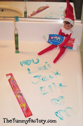 Elf holding tooth paste