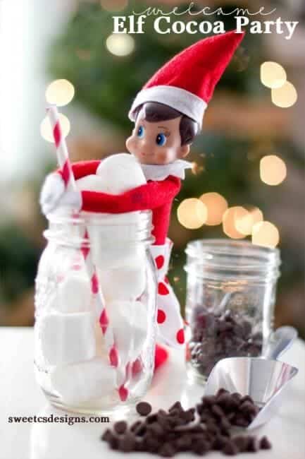 Top 50 of the BEST Elf on the Shelf ideas - So many fun ideas to do with your Elf leading up to Christmas! Your family will love these list amazing list of elf ideas! Elf having a hot cocoa party
