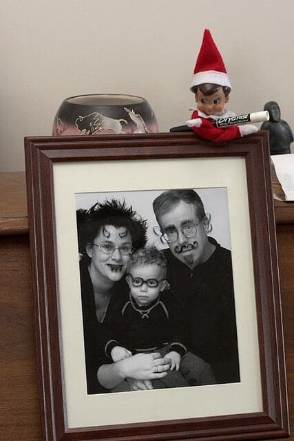 Top 50 of the BEST Elf on the Shelf ideas - So many fun ideas to do with your Elf leading up to Christmas! Your family will love these list amazing list of elf ideas! Elf coloring on the family picture