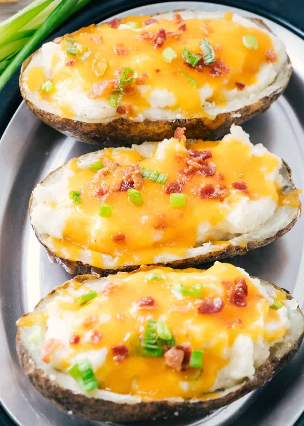 double baked potatoes on a silver plate 