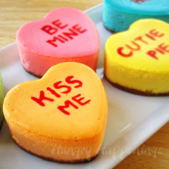 conversation heart cheesecakes on plate