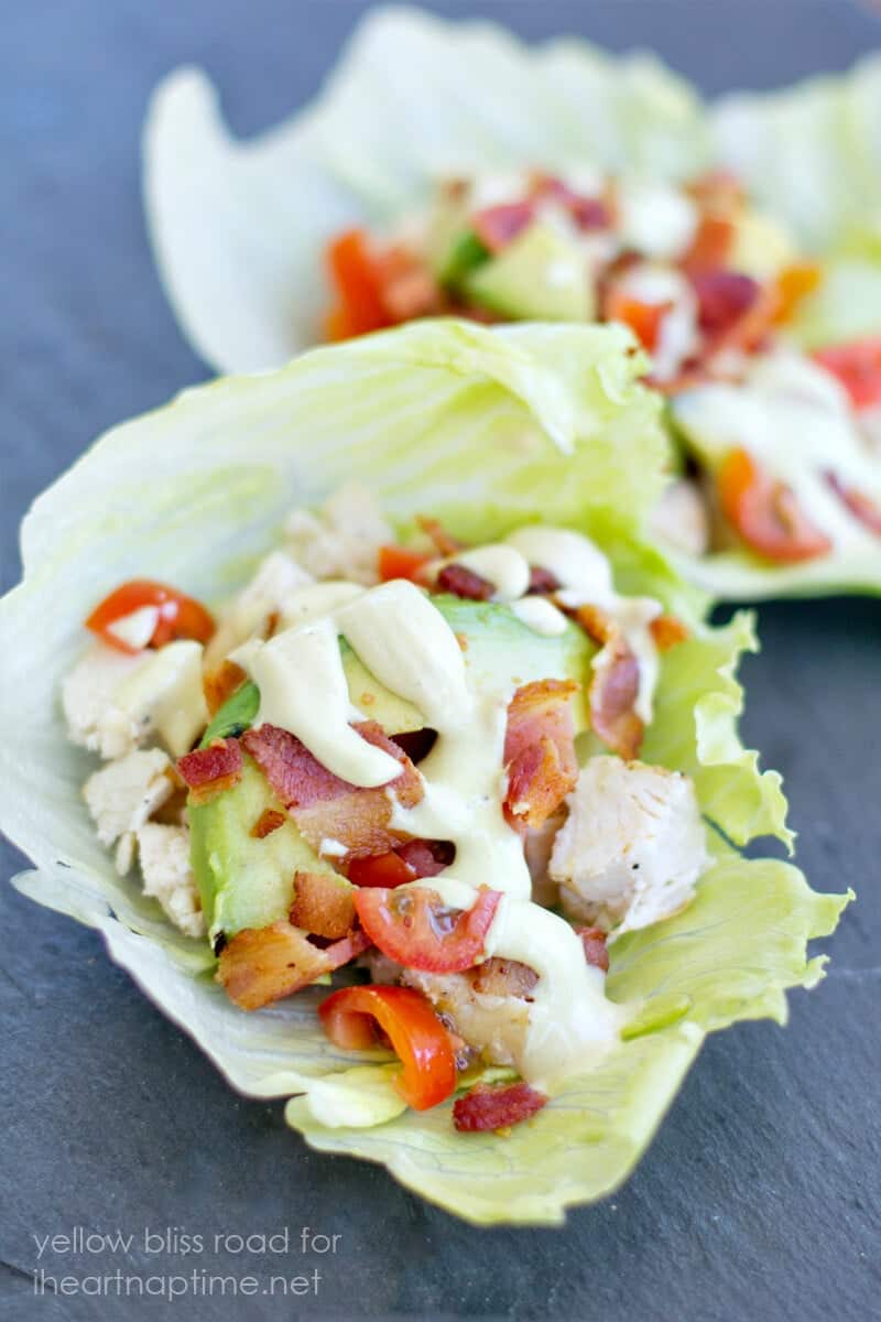 Chicken club lettuce wrap topped with dijon sauce. 