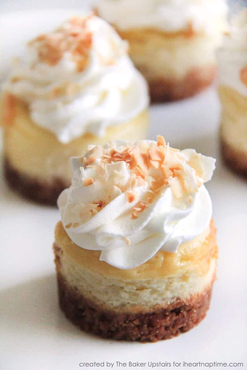 close up of mini coconut cheesecakes on plate