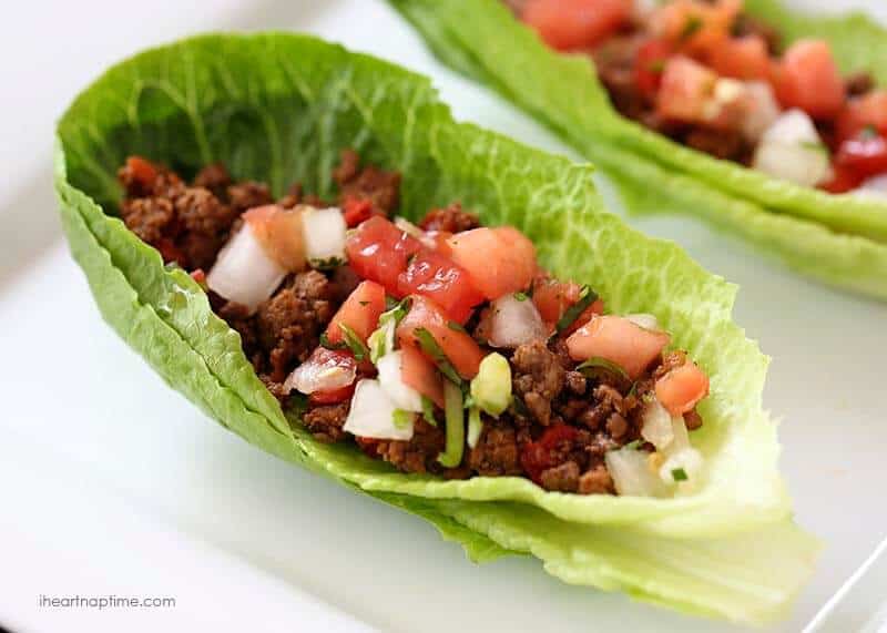 Lettuce cup with taco meat and pico de gallo.