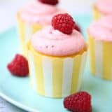 lemon raspberry cupcake with a fresh raspberry on top