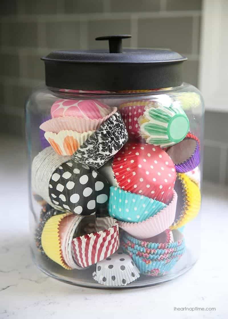 White and grey kitchen makeover on iheartnaptime.com -love the cupcake liners in jar! 