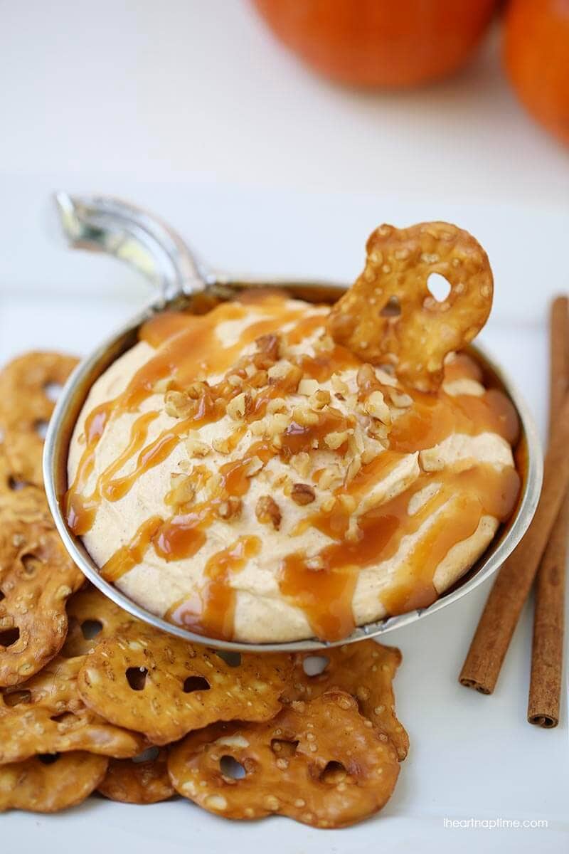 Pumpkin cream cheese dip with pretzels for dipping. 
