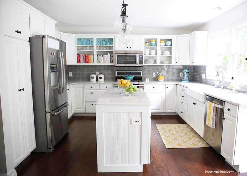 A kitchen with a wood floor