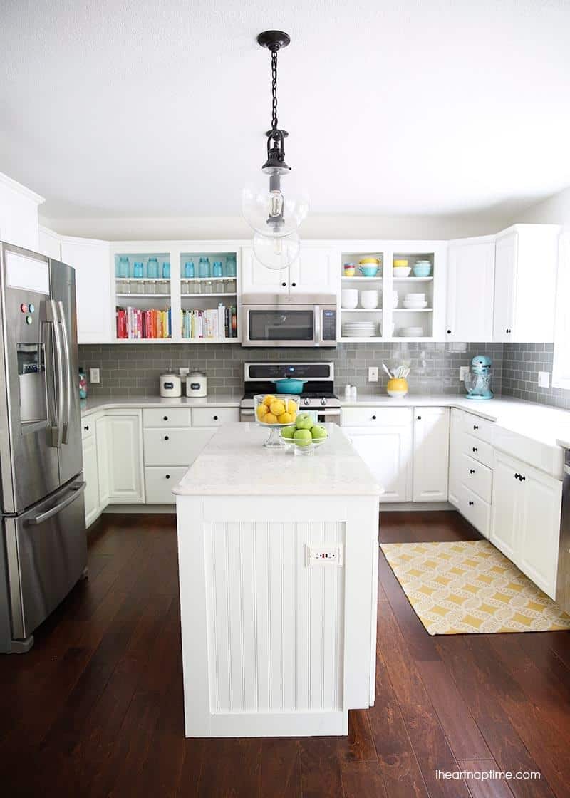 A kitchen with a wooden floor