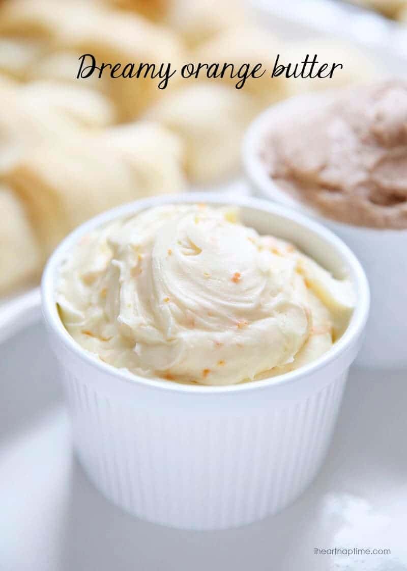 Orange butter in a white bowl.