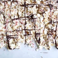 peppermint bark popcorn drizzled with chocolate