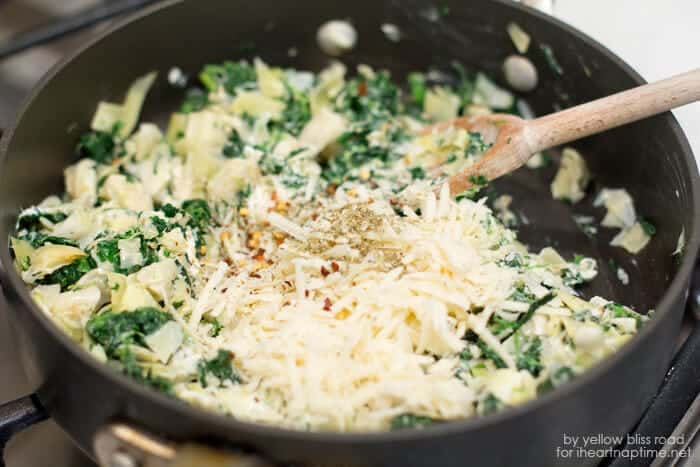 cooking spinach artichoke dip on skillet 