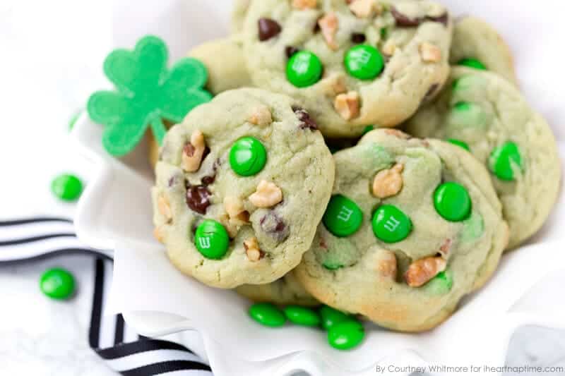 A close up of pistachio and chocolate leprechaun cookies 