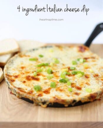 smoked italian cheese dip in skillet on wood board