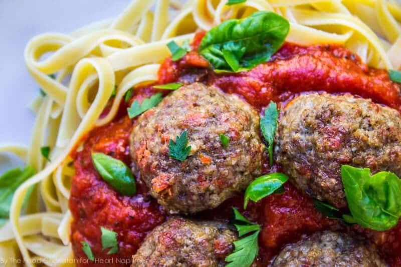 Pepperoni meatballs served over pasta and marinara.