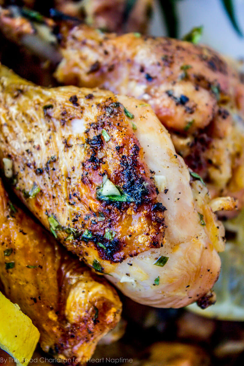 A close up of grilled lemon tarragon chicken thigh