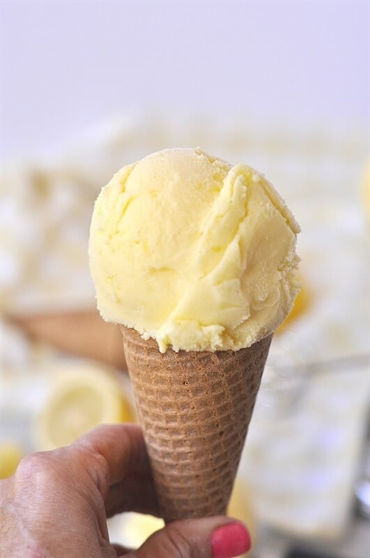scoop of lemonade ice cream on waffle cone 