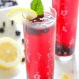 blueberry mint lemonade in a tall glass