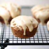 maple glazed snickerdoodle muffin on cooling rack