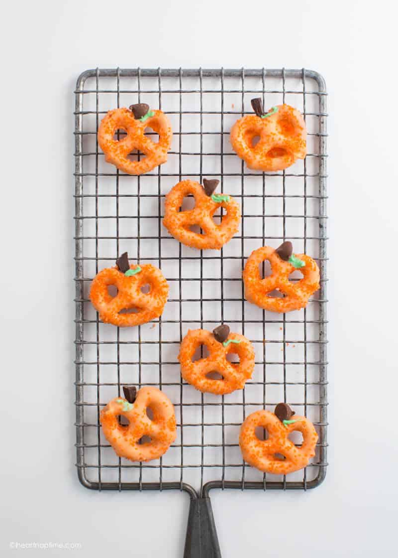 Quick, easy, and delicious Chocolate Covered Pretzel Pumpkins make the perfect family-friendly project and snack!