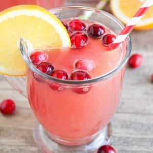 Simple Holiday Punch Recipe - made with pineapple, cranberry and orange juice! Easy to make and such a delicious combination!