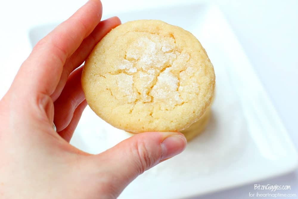 hand holding an angel sugar cookie