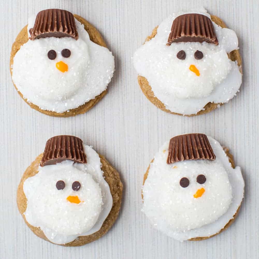 Four snowman cookies.