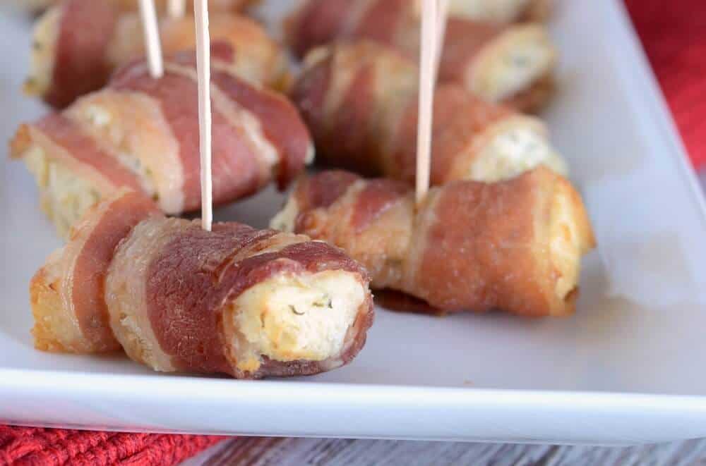 Bacon bread bites with a toothpick in the middle.