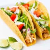 slow cooker chicken tacos in taco shell