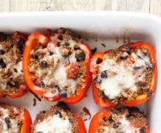 Stuffed Bell Peppers with Quinoa - a delicious, healthy, and quick meal my whole family enjoyed (I was pleasantly surprised that the kids ate these happily and quickly!)
