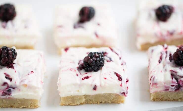 Blackberry Cheesecake Bars - made with a sugar cookie crust, cream cheese filling, and blackberry topping. An incredibly easy dessert to make and seriously divine. These are the absolute perfect treat for Spring!
