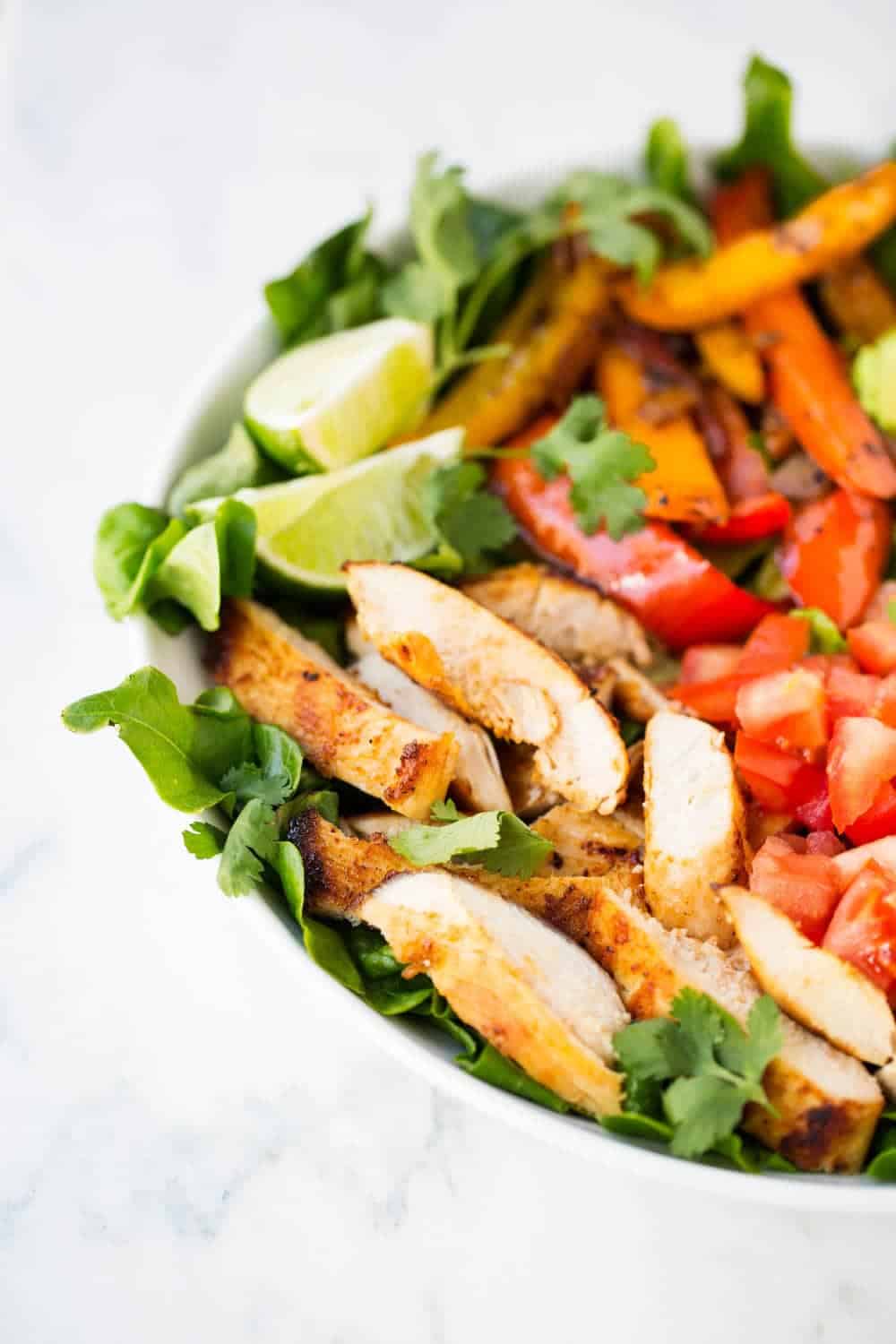 Close up of fajita salad in bowl.