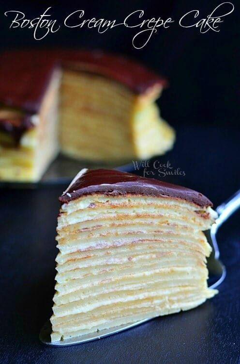 slice of boston cream crepe cake on a spoon 